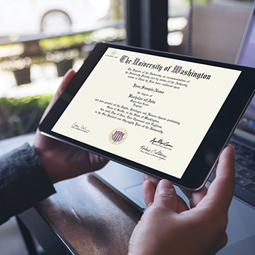 Person holding tablet showing a University of Washington CeCertificate on the screen Person holding tablet showing a University of Washington CeCertificate on the screen