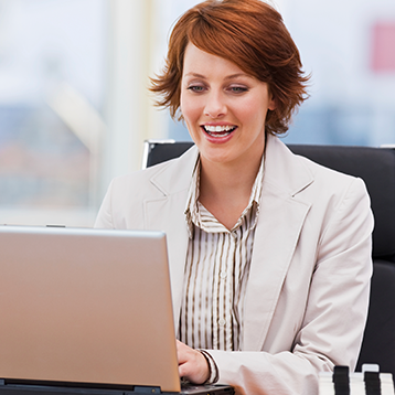 Female Registrar on Computer