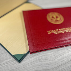 High-quality custom diploma cover with gold university seal and padded interior — Paradigm’s premium graduation presentation solution.