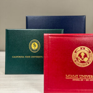 Custom diploma covers with university seals from Paradigm — durable, elegant designs for graduation diplomas and certificates.